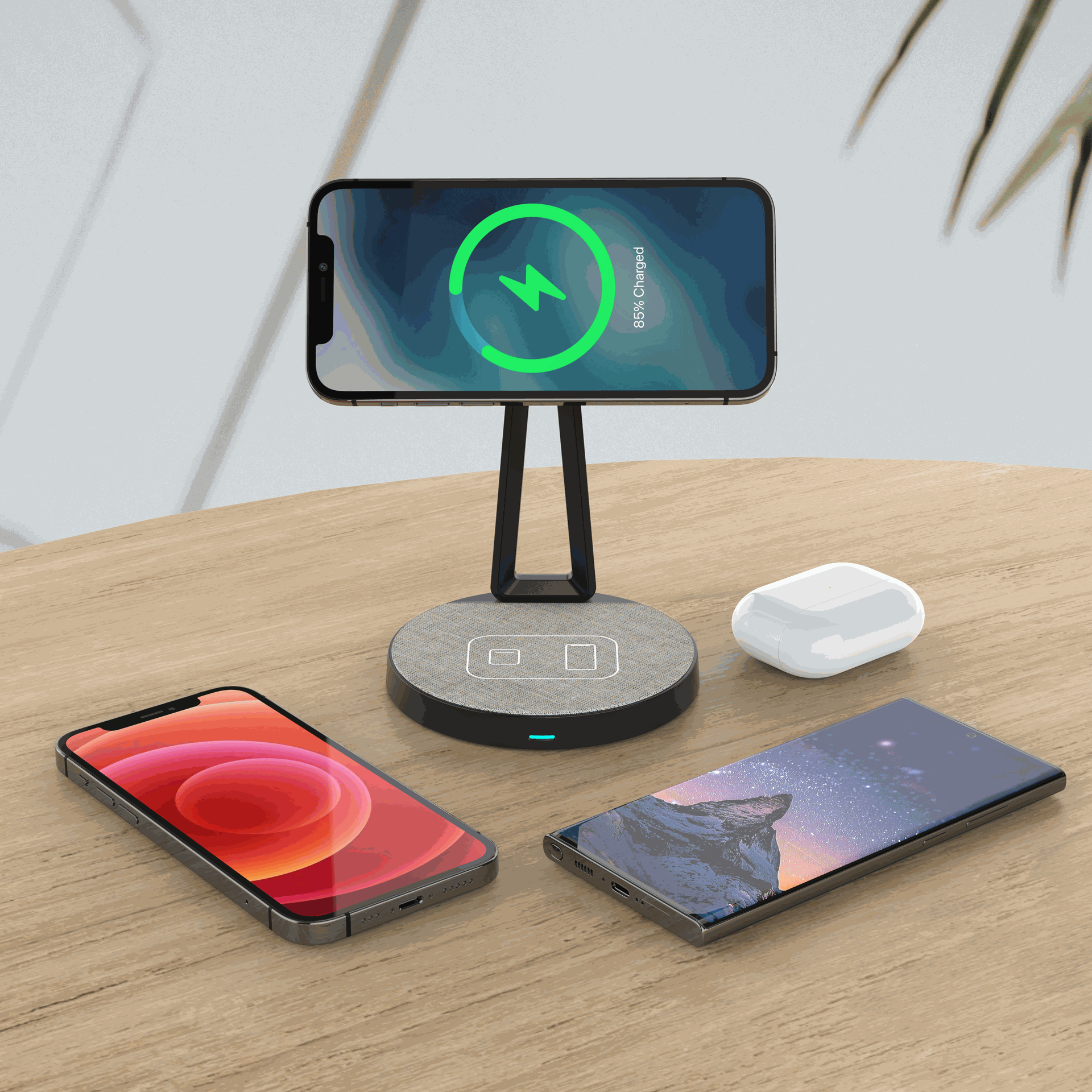 alt="charging stand is charging smartphone and earbuds wirelessly"